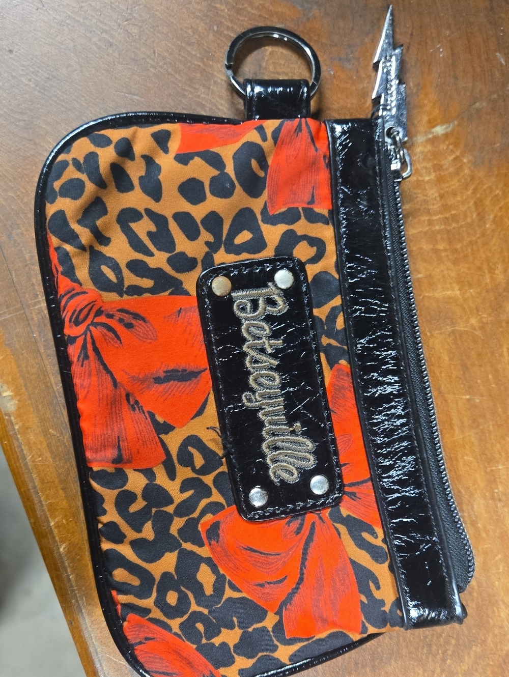 Betsey Johnson Orange Black Leopard Bow Wristlet